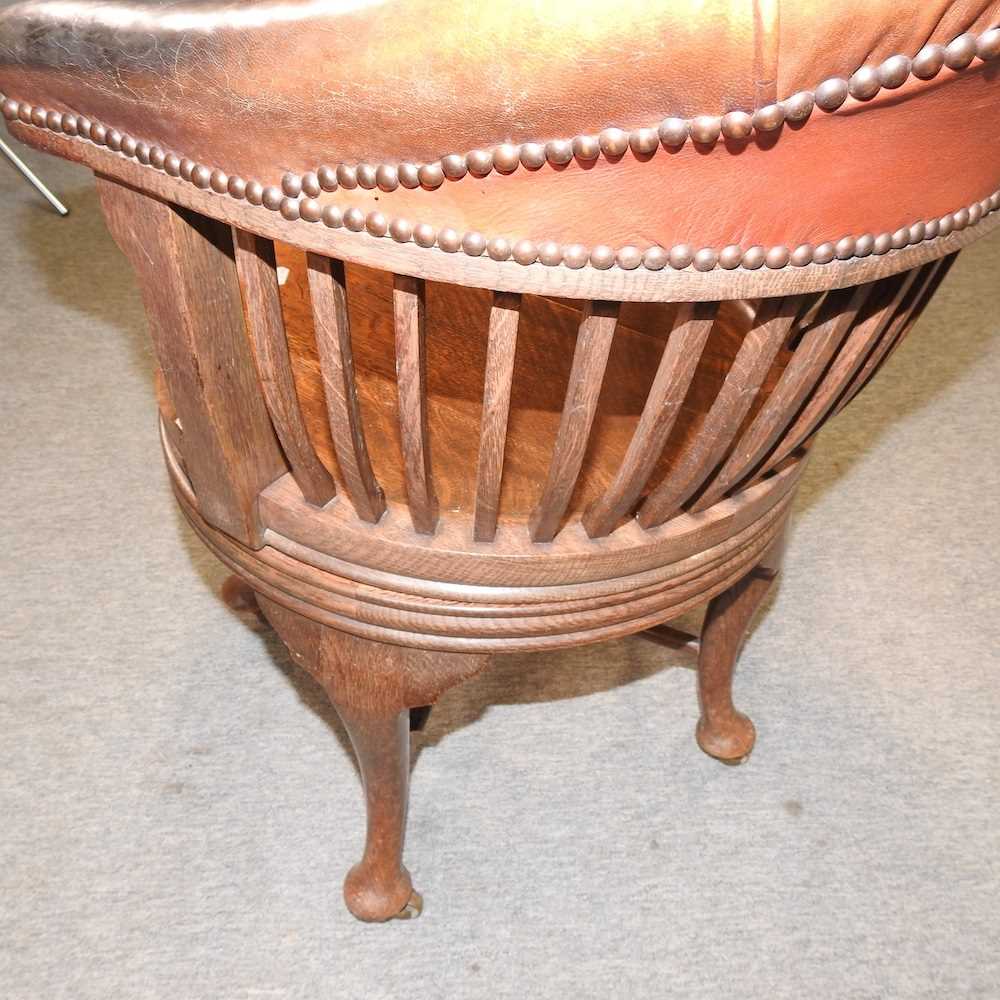 A late Victorian oak and leather upholstered swivel desk chair, - Image 5 of 6