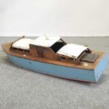 A mid 20th century painted wooden boat,