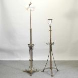 An ornate brass standard lamp,