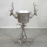 A large metal stag wine cooler,