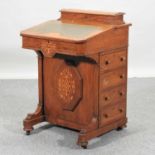 A Victorian walnut and inlaid davenport,