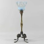 An early 20th century brass Arts and Crafts lamp and shade
