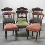 A set of four dining chairs, together with a pair