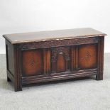 A carved oak coffer,