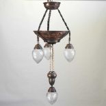 An ornate early 20th century gilt metal pendant ceiling light