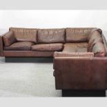 A Danish 1960's design brown 'buffalo' leather upholstered corner sofa,