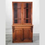 A Victorian mahogany cabinet bookcase