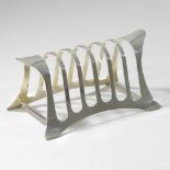 A white metal six division toast rack