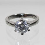 A platinum set diamond solitaire ring