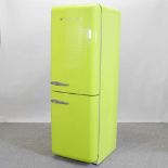 A SMEG lime green fridge-freezer,