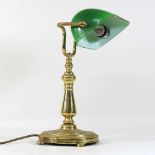 A brass desk lamp