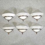 A set of six Art Deco style metal wall lights