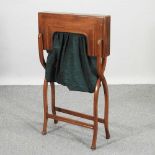 An Edwardian folding ladies sewing table