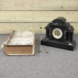 A Victorian black slate mantel clock,