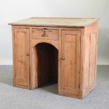 An early 20th century pitch pine and pine clerk's desk