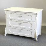 A modern cream painted French style chest