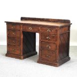 A 19th century Arts and Crafts pitch pine pedestal desk,