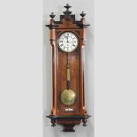 A 19th century Vienna style regulator wall clock