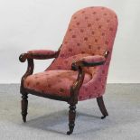 A Victorian rosewood and red upholstered armchair