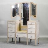 An Edwardian and later cream painted dressing table