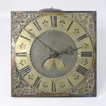 An 18th century brass longcase clock dial