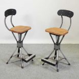 A pair of modern industrial style bar stools