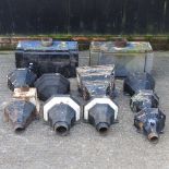 A collection of cast iron hoppers