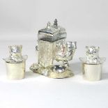 A novelty plated and glass cruet,