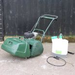 An Atco Balmoral lawnmower with scarifier