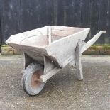 A wooden wheelbarrow