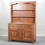 An Ercol style elm dresser