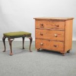 An antique pine chest of drawers