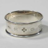 A Millennium silver napkin ring