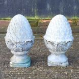 A pair of resin gatepost finials