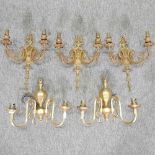 A set of three gilt brass twin branch wall lights