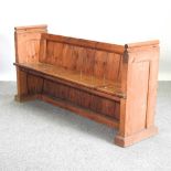 An early 20th century pitch pine pew