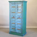 An Indian painted hardwood cabinet