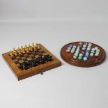 A mid 20th century travelling chess set