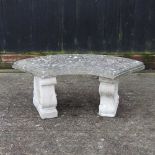 A reconstituted stone garden bench