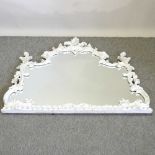 A decorative white painted wall mirror