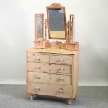A Victorian stripped pine dressing chest