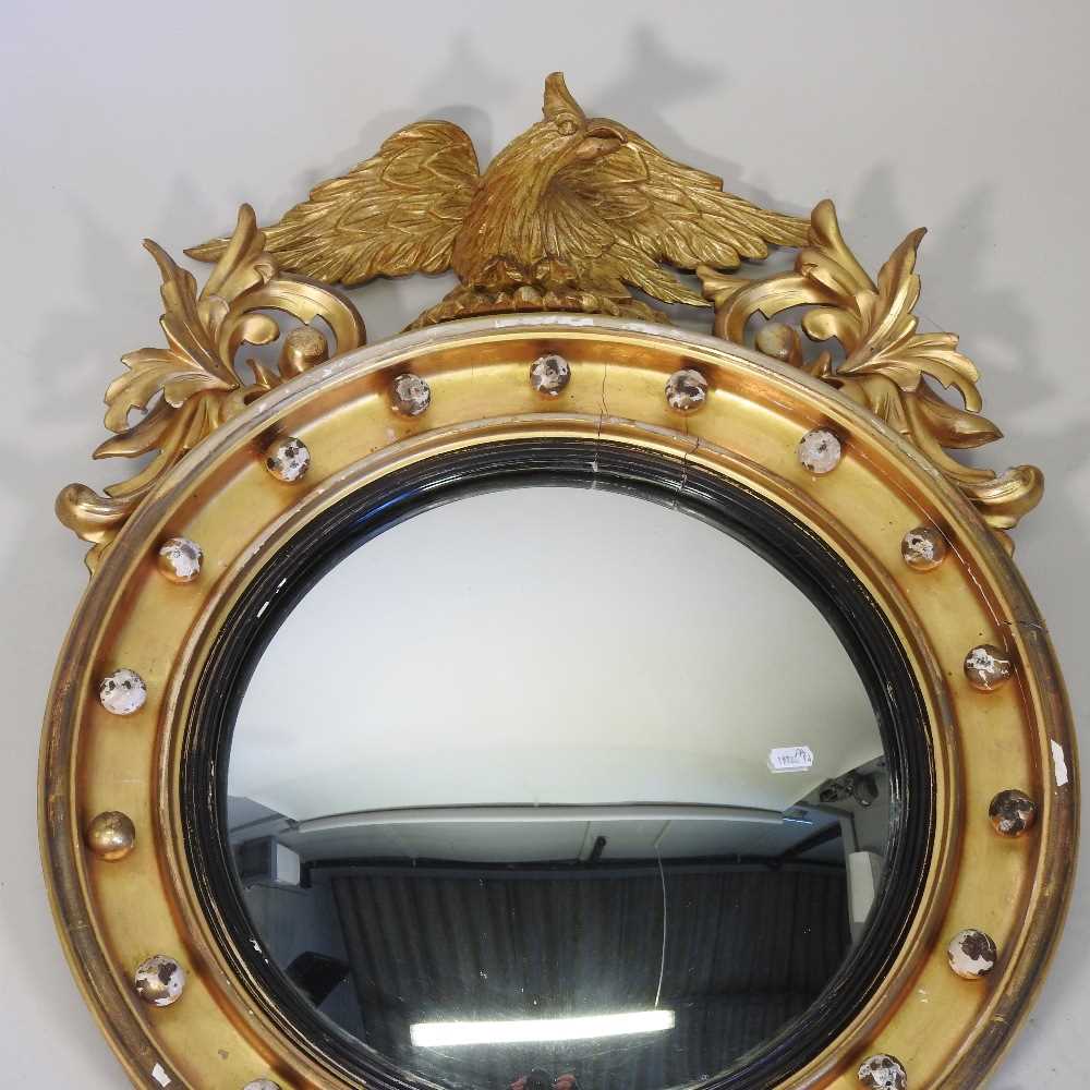 A Regency carved pine and gilt gesso framed convex wall mirror - Image 5 of 18