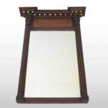 A Regency rosewood and inlaid wall mirror