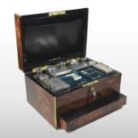A Victorian burr walnut and brass bound dressing case
