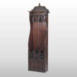 An unusual Victorian bespoke made carved oak gun cabinet