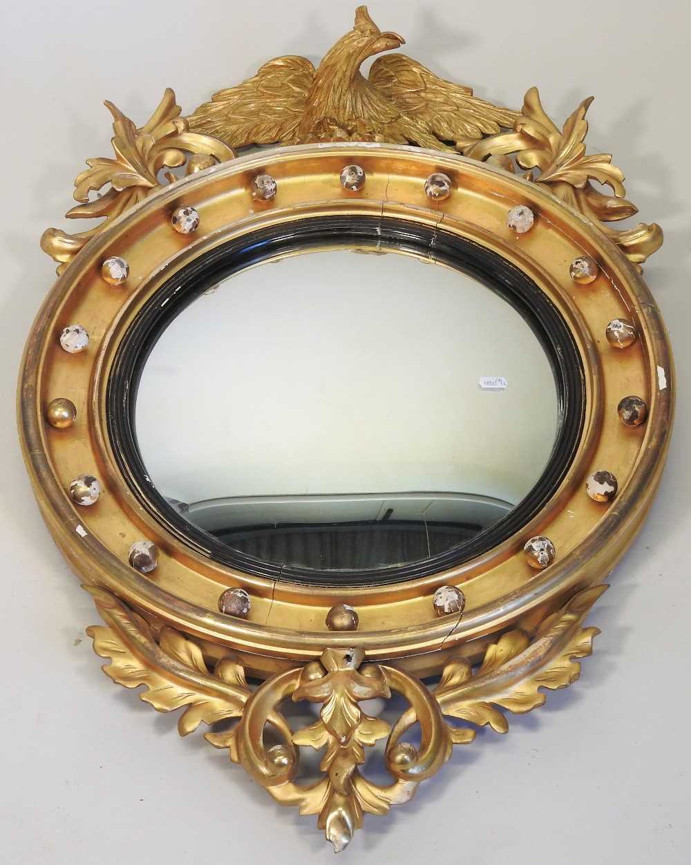 A Regency carved pine and gilt gesso framed convex wall mirror - Image 3 of 18