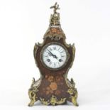 An early 20th century French rosewood and marquetry cased mantel clock