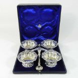 An early 20th century silver four piece condiment set