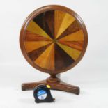 A Victorian miniature radially veneered specimen wood breakfast able