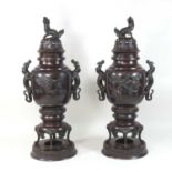 A pair of early 20th century Chinese bronze pot potpourri vases and covers,